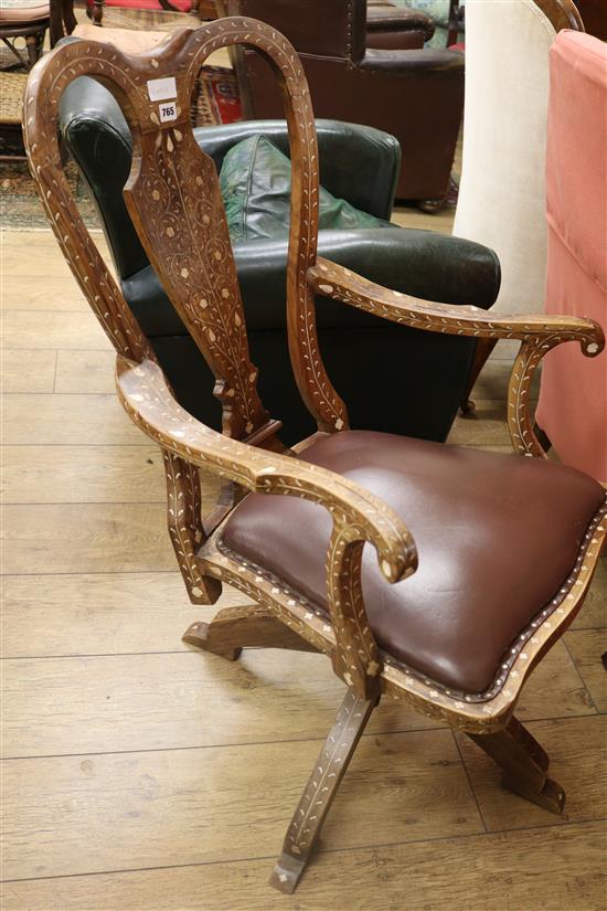 An Eastern bone inset swivel chair